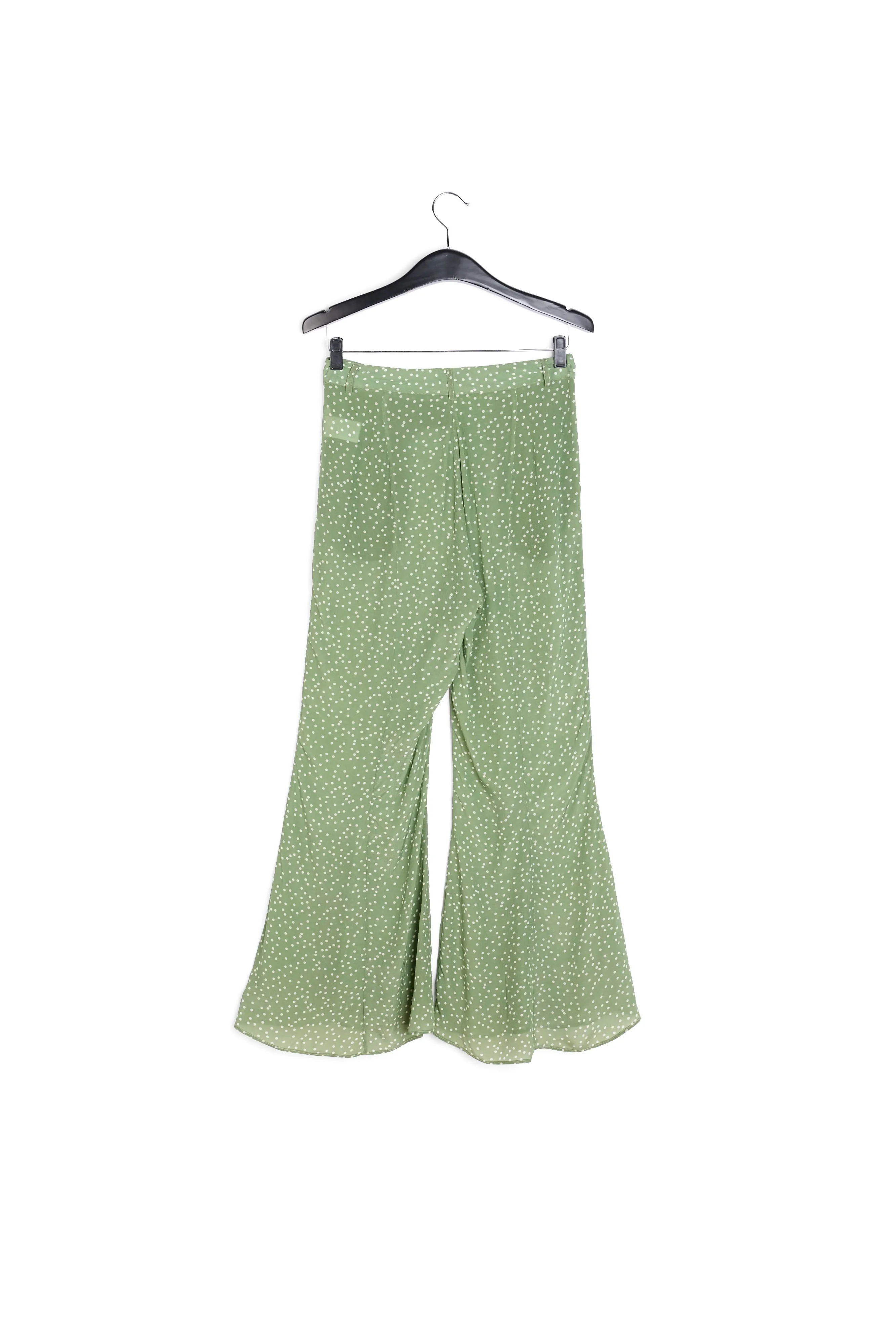 Green polka dot flared pants